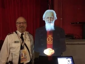 man standing next to einstein interactive hologram
