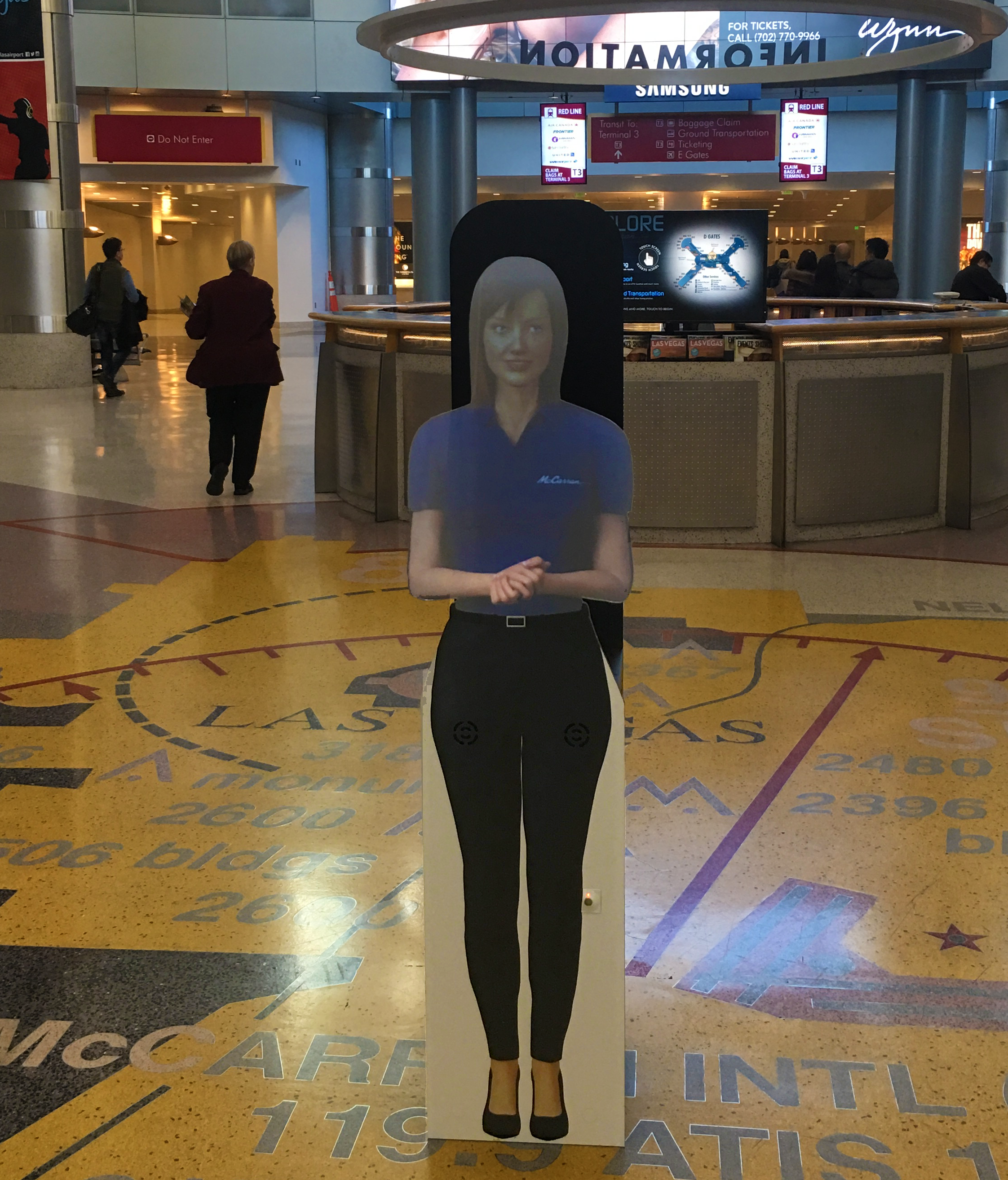 female prsonas hologram standing in mccarran airport